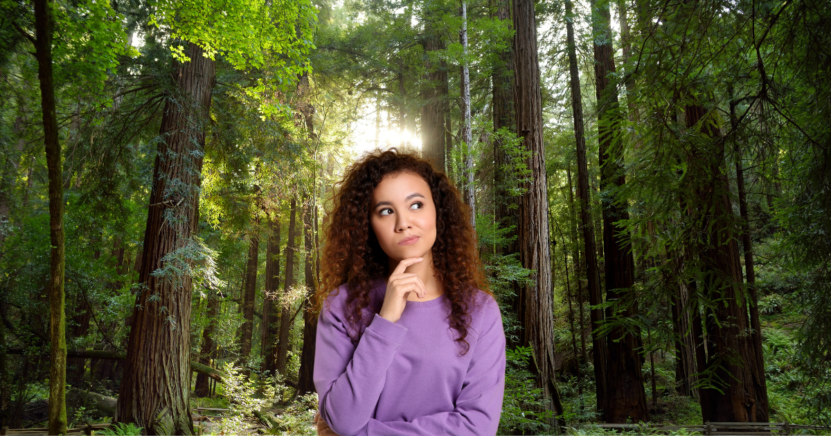 Woman thinking in the forest